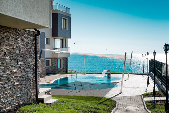 Vela ombreggiante motorizzata per giardino